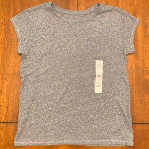 Gray light weight shirt with front pocket & pink stitching.